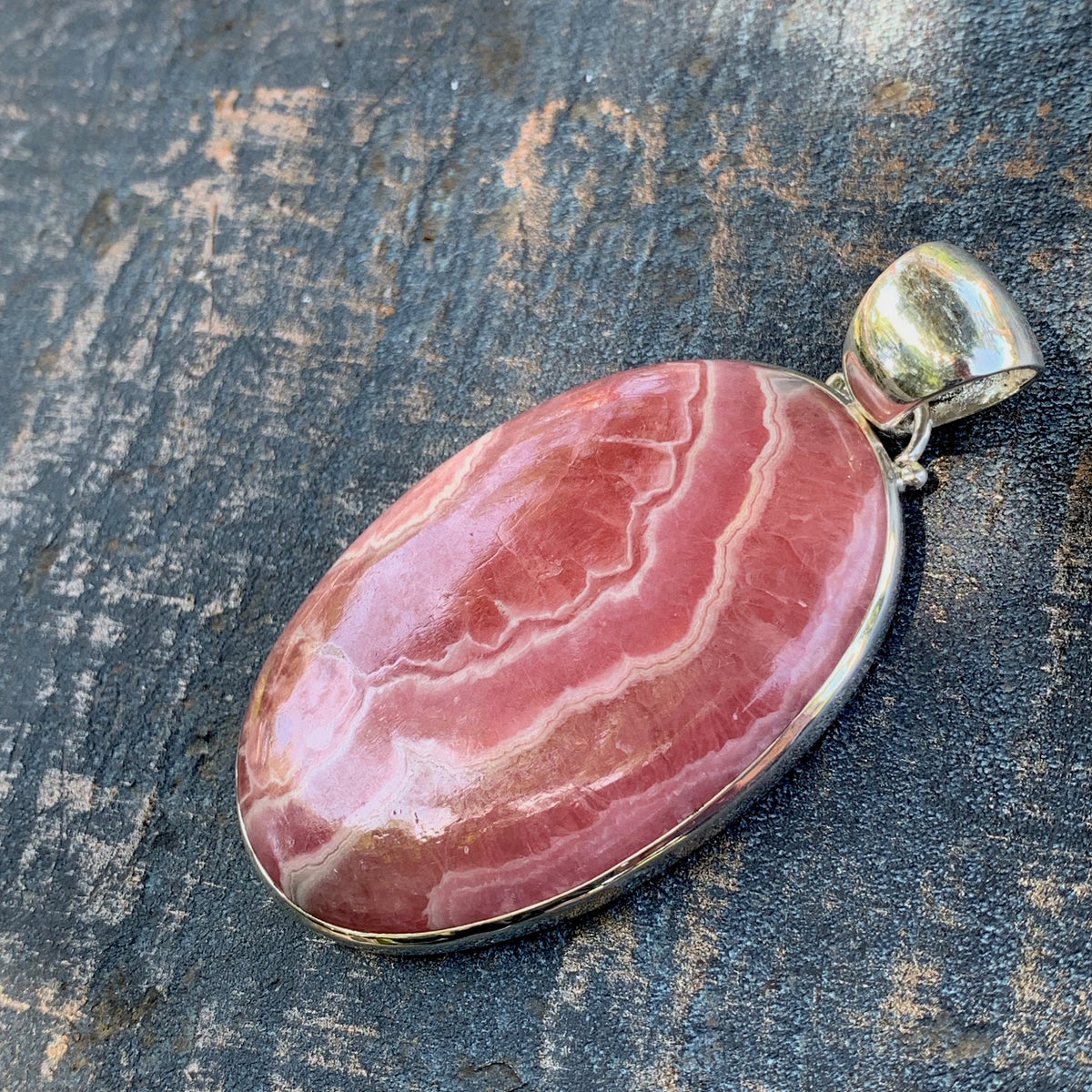 Large Rhodochrosite pendant in 925 Sterling Silver, deals 36x63mm stone, 37g weight